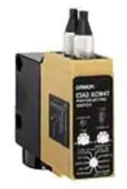 Omron E3A2-XCM4, industrial sensor proximity switch with compact design and black and beige color scheme.