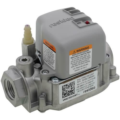 Honeywell air compressor, industrial equipment for air compression with warning labels and metallic components.