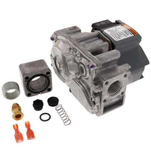 Honeywell gas valve assembly, metallic valve with attached control units and various small replacement parts for industrial safety and automation.