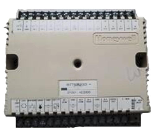Honeywell electrical control module, beige rectangular device with multiple terminal connectors on top, used for automation and industrial control systems.