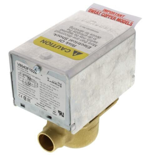Honeywell relay, electrical component with a white and yellow casing and a brass connector