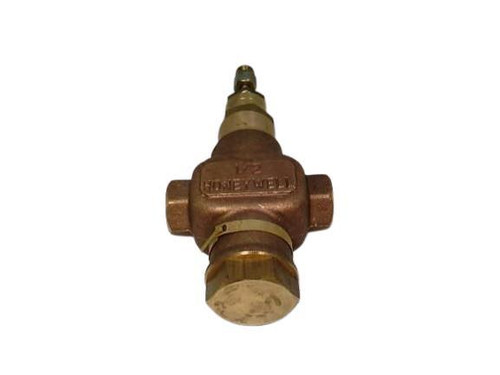 Honeywell product, a brass safety valve with inlet and outlet ports.