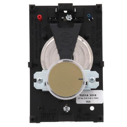 Honeywell Electrical Relay, close-up view showing black plastic casing, metallic contact points, and wiring connectors.