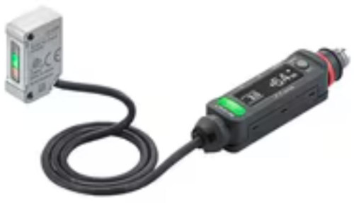 Keyence product, electronic sensor with green indicator light connected to a small grey control module.