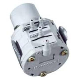 Honeywell product, industrial device with multiple connection ports and metallic fittings for technical applications.