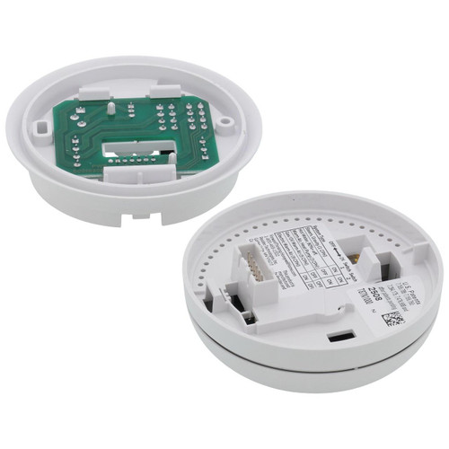 Honeywell, disassembled smoke detector sensors and internal components.