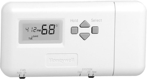 Honeywell Digital Thermostat, white electronic thermostat display showing indoor temperature and time.