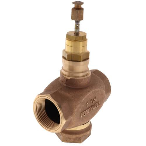 Honeywell valve, industrial brass valve with threaded opening and adjustment components.