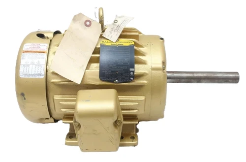 Baldor EM36631, industrial electric motor with a beige exterior and metal shaft, used for industrial machinery and equipment.