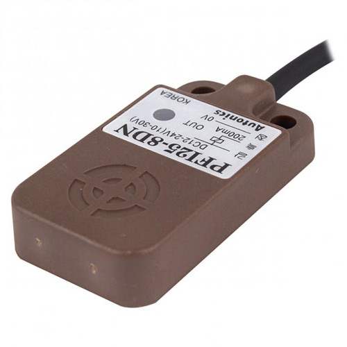 Autonics PFI25-8DP, proximity sensor with brown rectangular body and black cable attachment for industrial automation and sensing applications.