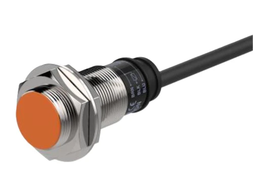 Autonics PR18-5DP, industrial proximity sensor with orange sensing face and metal threaded body.