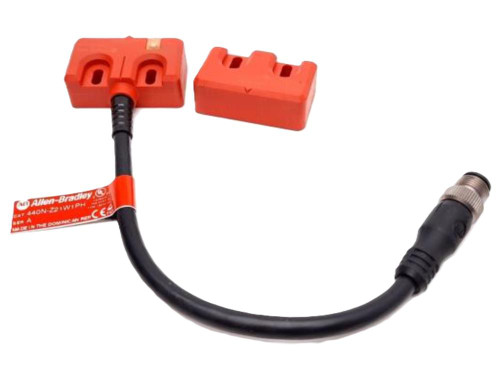 Allen-Bradley 440N-Z21W1PH, industrial sensor with cable and connector and red protective covers.