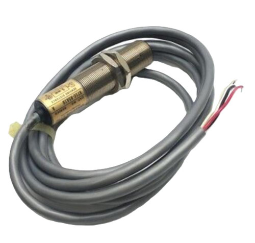 Allen-Bradley 871CK2A12, industrial sensor with metal body and electrical cables for automation equipment.