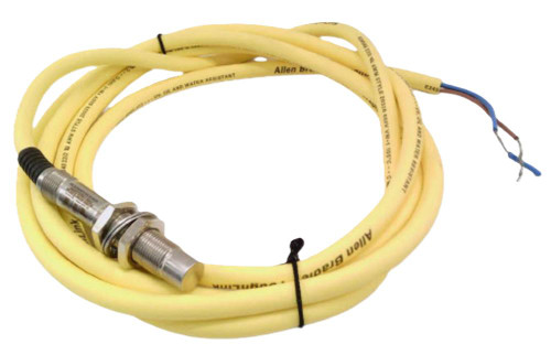 Allen-Bradley sensor, industrial sensor with yellow cable and metallic sensing part for automation systems.