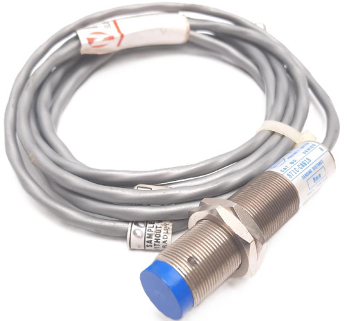 Allen-Bradley sensor, industrial sensor with metallic threaded body and cable for automation applications.