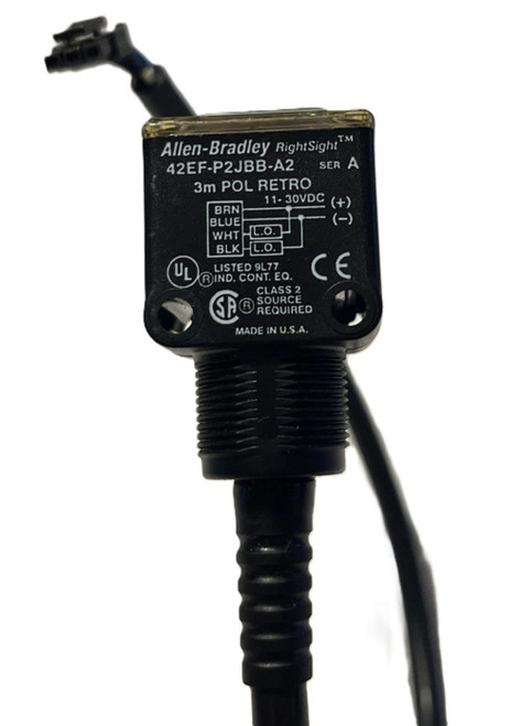 Allen-Bradley, 3m POL RETRO proximity sensor with black rectangular body, wiring diagram, and attached cable for industrial automation.