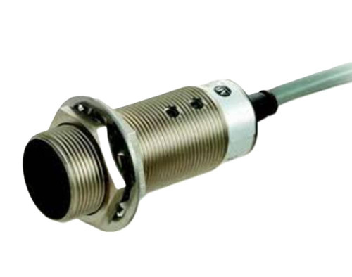Allen-Bradley D1NN5-E2, industrial sensor with cylindrical metal body and electrical cable for automation applications