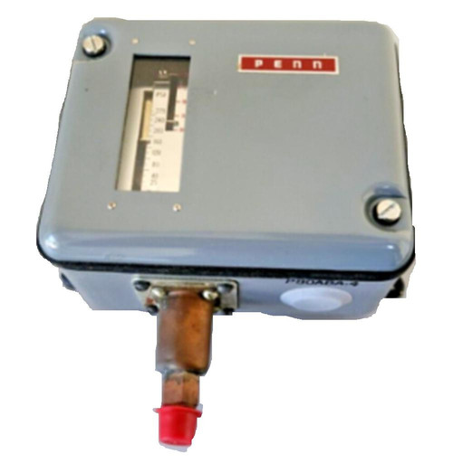 Johnson Controls P80ABA-4, industrial electrical control panel with a gray metal enclosure, display window, and a copper pipe connection with red valve at the bottom.