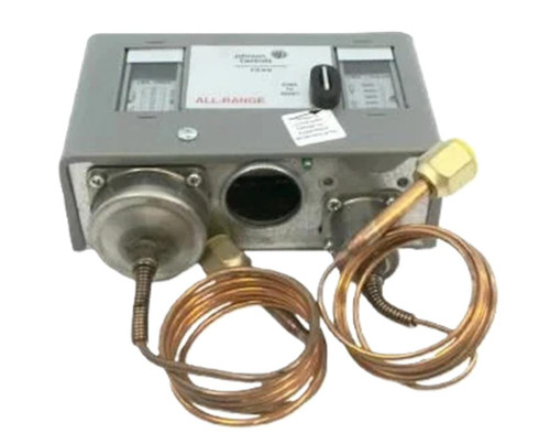Johnson Controls P72NA-1, industrial heating control panel with copper coils and metal components.
