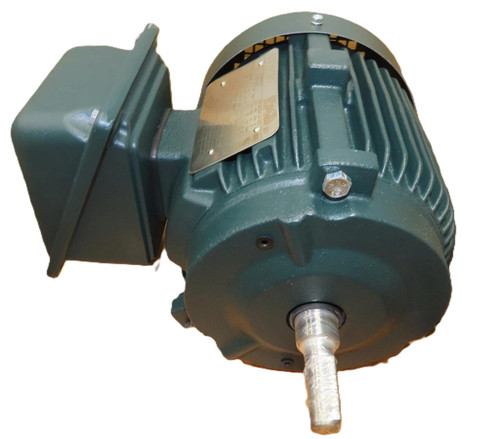 Toshiba 0014SDSR41H-P, industrial electric motor with green casing and metal shaft.
