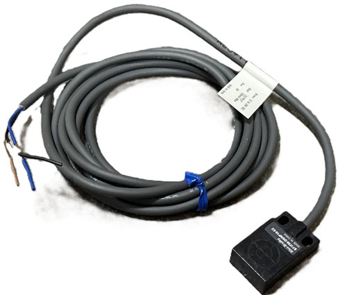 Allen-Bradley 871FM-D5NP10-E2, industrial sensor with a black rectangular sensing head and attached gray cable for automation applications.