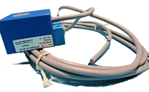 Allen-Bradley 871R-D12NP39-E2, industrial sensor or proximity switch with blue casing and multiple wires for automation equipment.