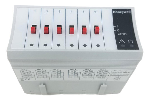 Honeywell XFR824A, electrical control relay module with multiple red switches and a black control panel on the side.