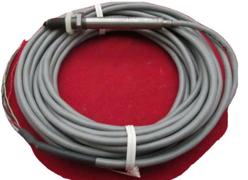 Automatic Timing & Controls 6021A01A01XX, electrical sensor with gray cable coiled on red background.