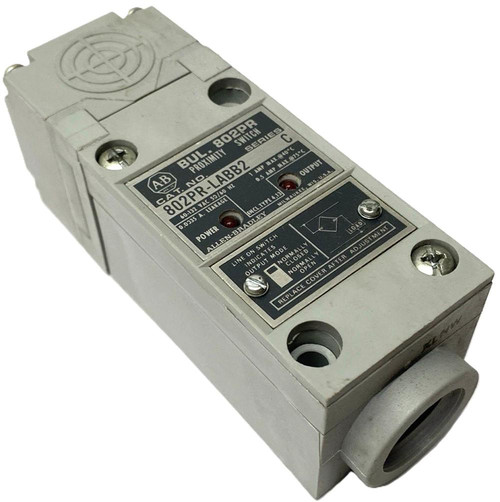 Allen-Bradley 802PR-LABB2, industrial proximity switch with rectangular metal body and black label with technical specifications and wiring diagram.