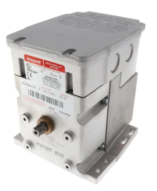 Honeywell M7284Q1082, industrial control module with metal casing and labeled terminals for connection.