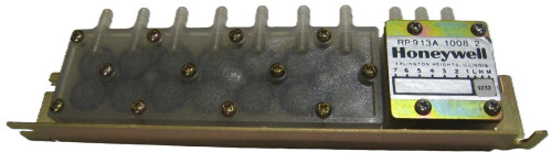 Honeywell RP913A1008 HVAC component, electronic control part with metal casing and label, used for heating and cooling systems.