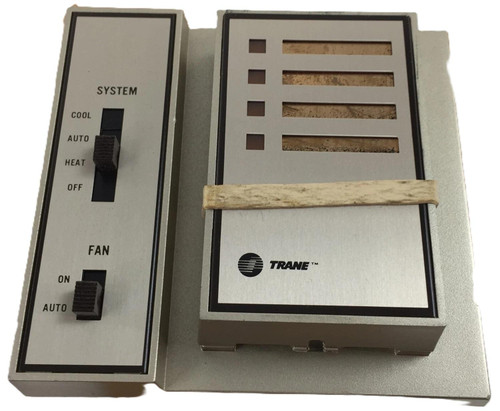 Honeywell W950E1144, industrial HVAC control panel with temperature and fan controls, including switches for COOL, AUTO, HEAT, OFF, and FAN ON, and a metal enclosure with vent slots.