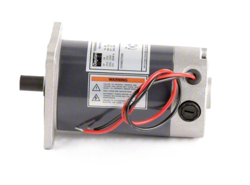 Dayton 23L404, electric motor with wiring and warning label for industrial or mechanical use.