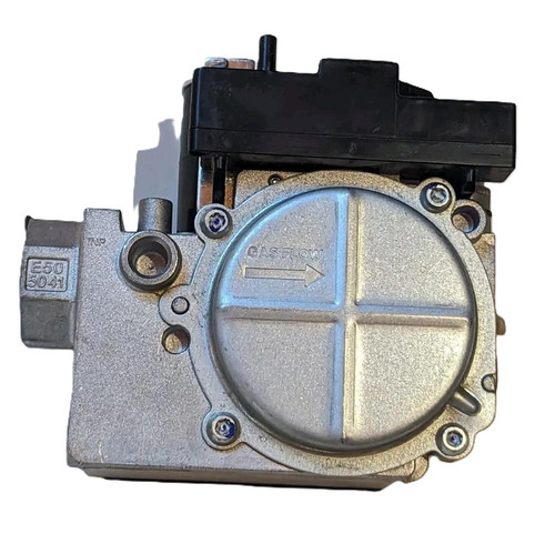 White-Rodgers, HVAC gas valve or regulator with metal and plastic components, used for controlling gas flow in heating systems.