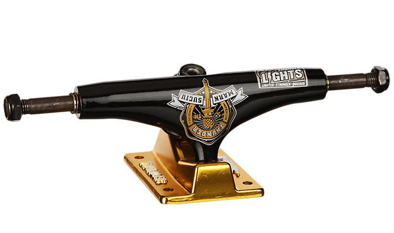 Thunder Suciu Lights Low Skateboard Trucks - 145mm - Black/Gold