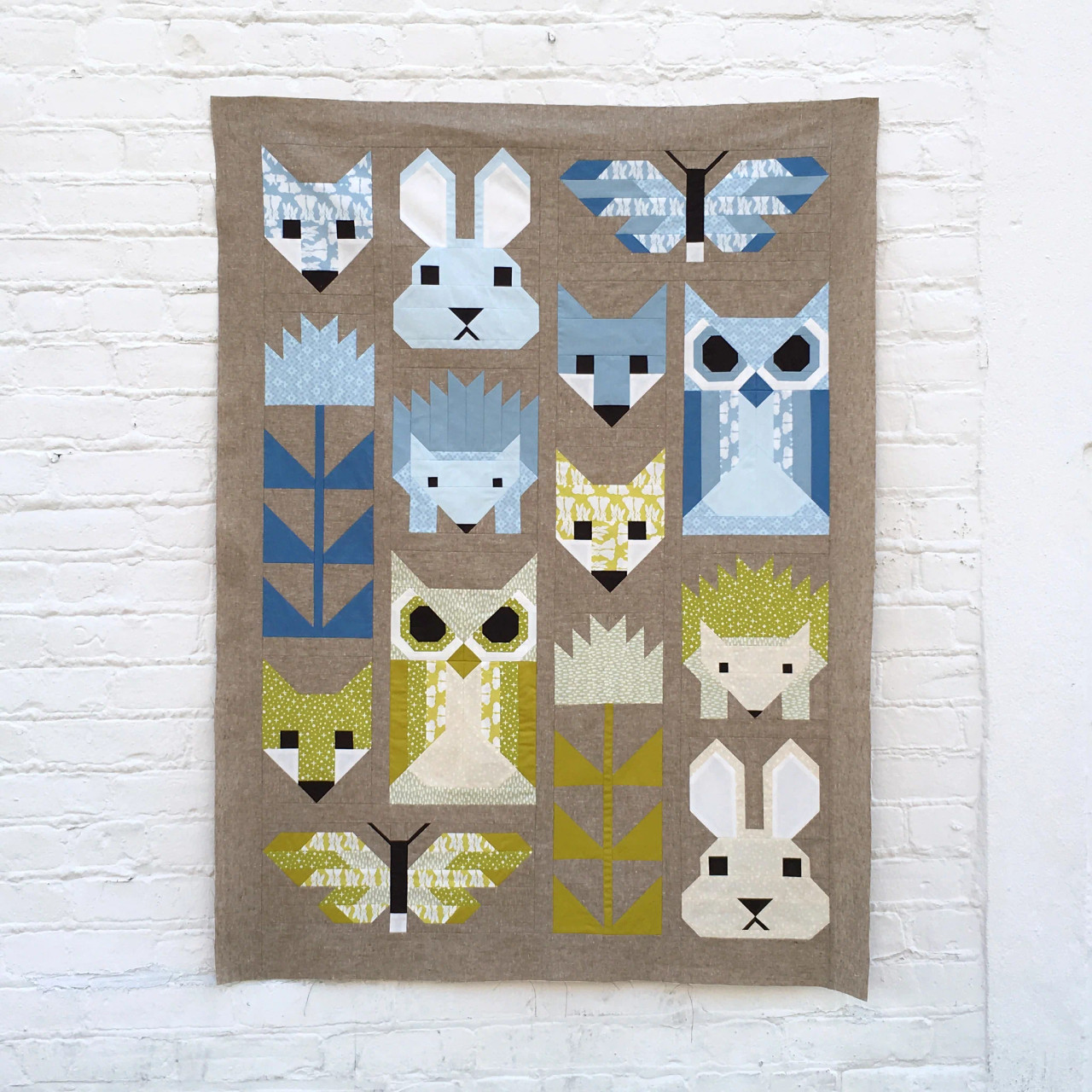 Adaptation from Elizabeth Hartman's Fancy Forest quilt pattern. Made for my  first grandchild.