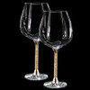 Pair of gold leaf filled stem wine glasses