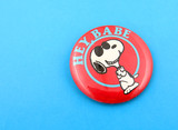 Snoopy Buttons Through History