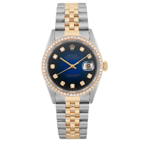 An image of a pre-owned men's luxury Rolex wristwatch shown from a front full frontal view. The watch features a round, blue vignette dial with diamond markers and a date indicator. It has a gold bezel and a band made from stainless steel and yellow gold. The watch is in good condition, showcasing a 12-hour dial and seconds hand.
