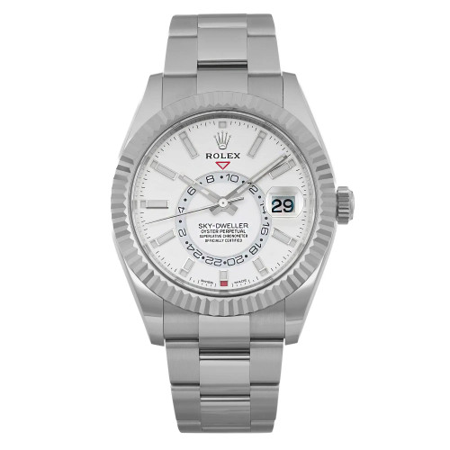 An image of a luxurious men's Rolex wristwatch, displayed in an unworn condition with a full frontal view. The watch features a round shape with a white dial and complemented by non-numeric hour marks and stick indexes. Its white gold bezel encircles the dial, while the date indicator at the 3 o'clock position is magnified, and GMT function is also visible. The hands are luminous for easy reading in the dark. The stainless steel band and case material add to the watch's elegant and timeless design. The image is taken from a front angle at a close distance, providing a clear and detailed view of the watch's features and craftsmanship.