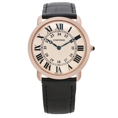 An image of a pre-owned Cartier men's wristwatch in excellent condition, shown from a full frontal view. The round watch features a cream dial with both Arabic and Roman numerals, and a 12-hour and 24-hour format. The bezel is crafted from 18k rose gold, complementing the luxurious dress/formal style. The band is made of leather.
