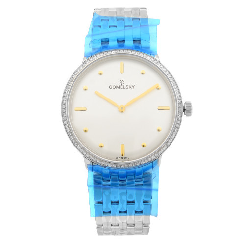 An image of a wristwatch displayed in a front full frontal view. The watch is unworn and features a sleek design with a silver case and a white dial. It has gold-tone hands and simple round hour markers. The bracelet is silver with a blue protective film. The brand name "GOMELSKY" is visible on the dial, and the watch is positioned upright, showcasing its classic and elegant style.