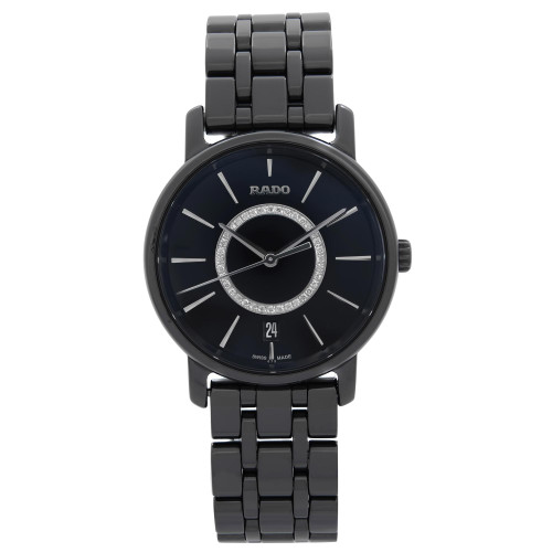 An image of a Wristwatch by Rado. This New With Defects item is designed for Women, featuring a Dress/Formal style. It has a Quartz movement and an Analog display with a Black dial color. The indices include 12-Hour Dial,Stick Indexes. The band is made of Ceramic and the case is made of Ceramic. The watch has a Round shape with a case size of 33 mm and a case thickness of 8 mm.