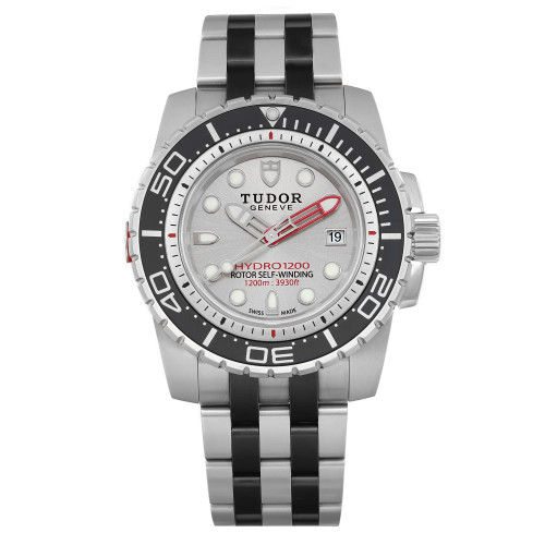 An image of a wristwatch shown from a front full-frontal view. The watch features a silver and black design with a prominent bezel and a metal strap. The face displays the brand name and various markings, including a date window on the right side. The image is taken at a close distance, highlighting the details and craftsmanship of the watch.