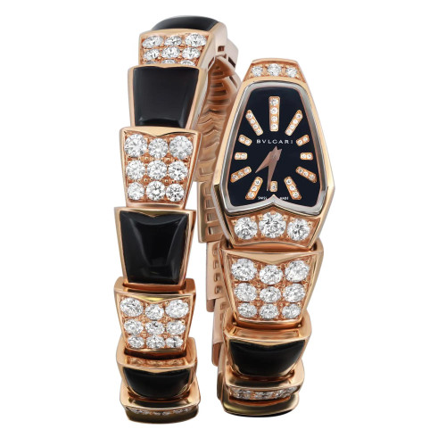 An image of a pre-owned wristwatch displayed from a full frontal view. The watch features a unique design with a combination of black and diamond embellishments set in a gold-toned frame. The face of the watch is black with diamond hour markers, and the band consists of alternating square segments of black and diamond patterns. The angle is straight on, capturing the intricate details of the watch's luxurious design. The image is taken from a close distance to highlight the craftsmanship.