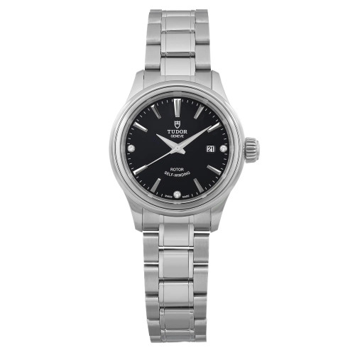 An image of a wristwatch in a front full frontal view. The watch is unworn and displayed at a close distance, showcasing its stainless steel bracelet and black dial. The watch face includes a date function and silver hour markers and hands. The crown is visible on the right side of the case.