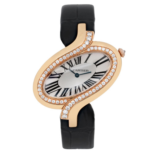 An image of a pre-owned Cartier Delices women's 18k yellow gold quartz wristwatch, viewed from the front at a slight angle. The watch features an elegant oval face with Roman numerals and a sleek black strap. The yellow gold gold case is adorned with a row of sparkling diamonds and silver dial, adding a touch of luxury. The image captures the watch in close-up, highlighting its intricate details and craftsmanship.