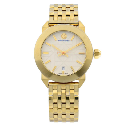 An image of a Wristwatch by Tory Burch. This Pre Owned item is designed for Men, featuring a Casual style. It has a Quartz movement and an Analog display with a Cream dial color. The indices include 12-Hour Dial,Stick Indexes. The band is made of Stainless Steel and the case is made of Stainless Steel. The watch has a Round shape with a case size of 35 mm and a case thickness of 8 mm.