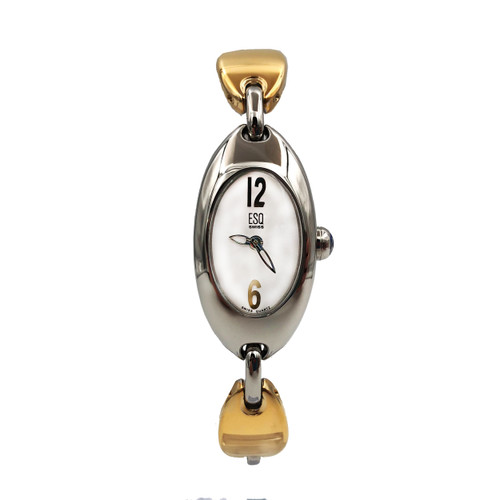 An image of a Wristwatch by ESQ. This Pre Owned item is designed for Women, featuring a Dress/Formal style. It has a Quartz movement and an Analog display with a Silver dial color. The indices include 12-Hour Dial,Arabic Numerals,No Hour Marks. The band is made of Stainless Steel and the case is made of Stainless Steel. The watch has a Oval shape with a case size of 18 mm and a case thickness of 7 mm.
