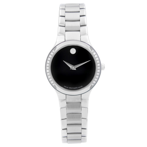 An image of a new and unworn Movado women's wristwatch in a dress/formal style, presented in a front full frontal view. It features a round stainless steel case with a steel-colored bezel adorned with diamonds The watch has a black dial with the iconic Movado dot at the 12 o'clock position and silver-tone hands. The band is made of stainless steel with a bracelet design. The watch is centered and occupies the majority of the frame, showcasing its elegant design and details clearly.